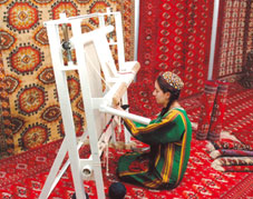 turkmenian girl with carpet